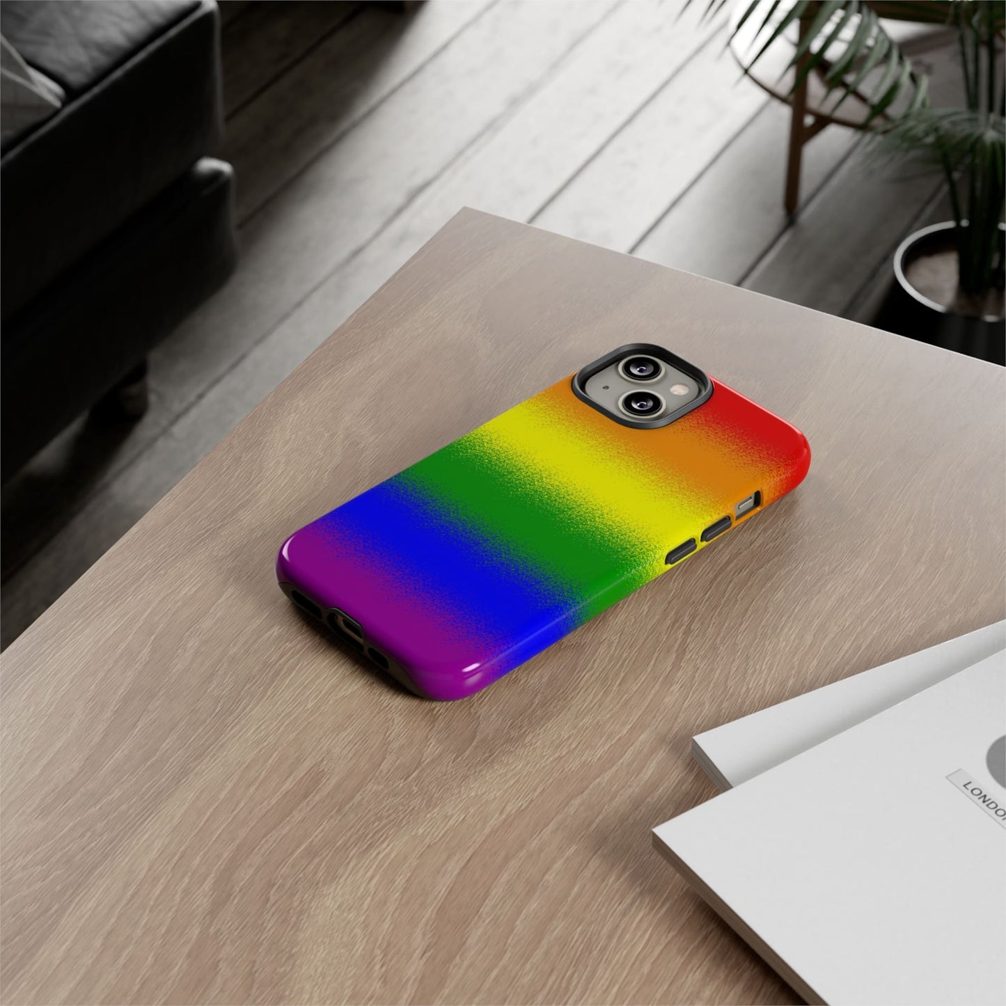 LGBT pride phone case sprayed rainbow flag, on table