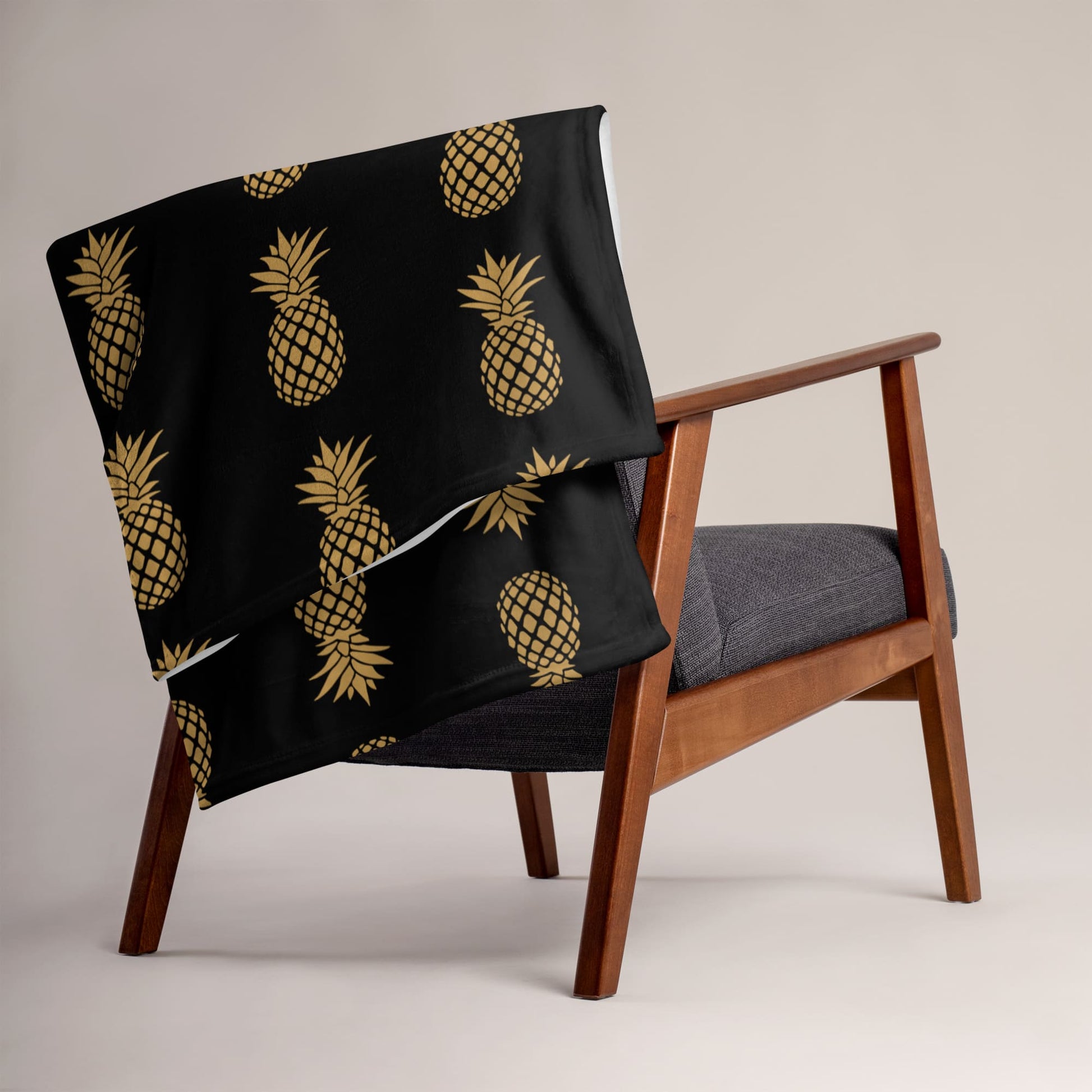 Swingers upside down pineapple blanket on chair