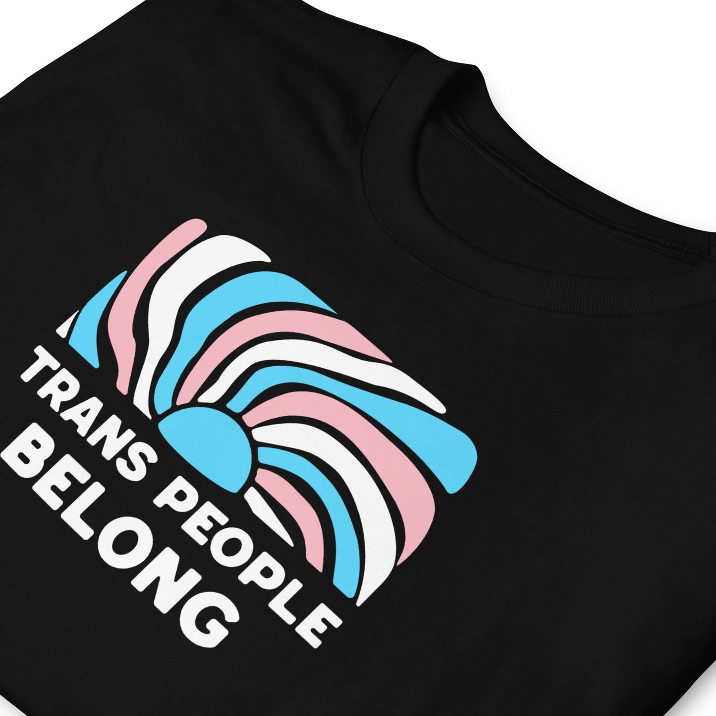 Black t-shirt with a modern design and text 'Trans People Belong' on a white background