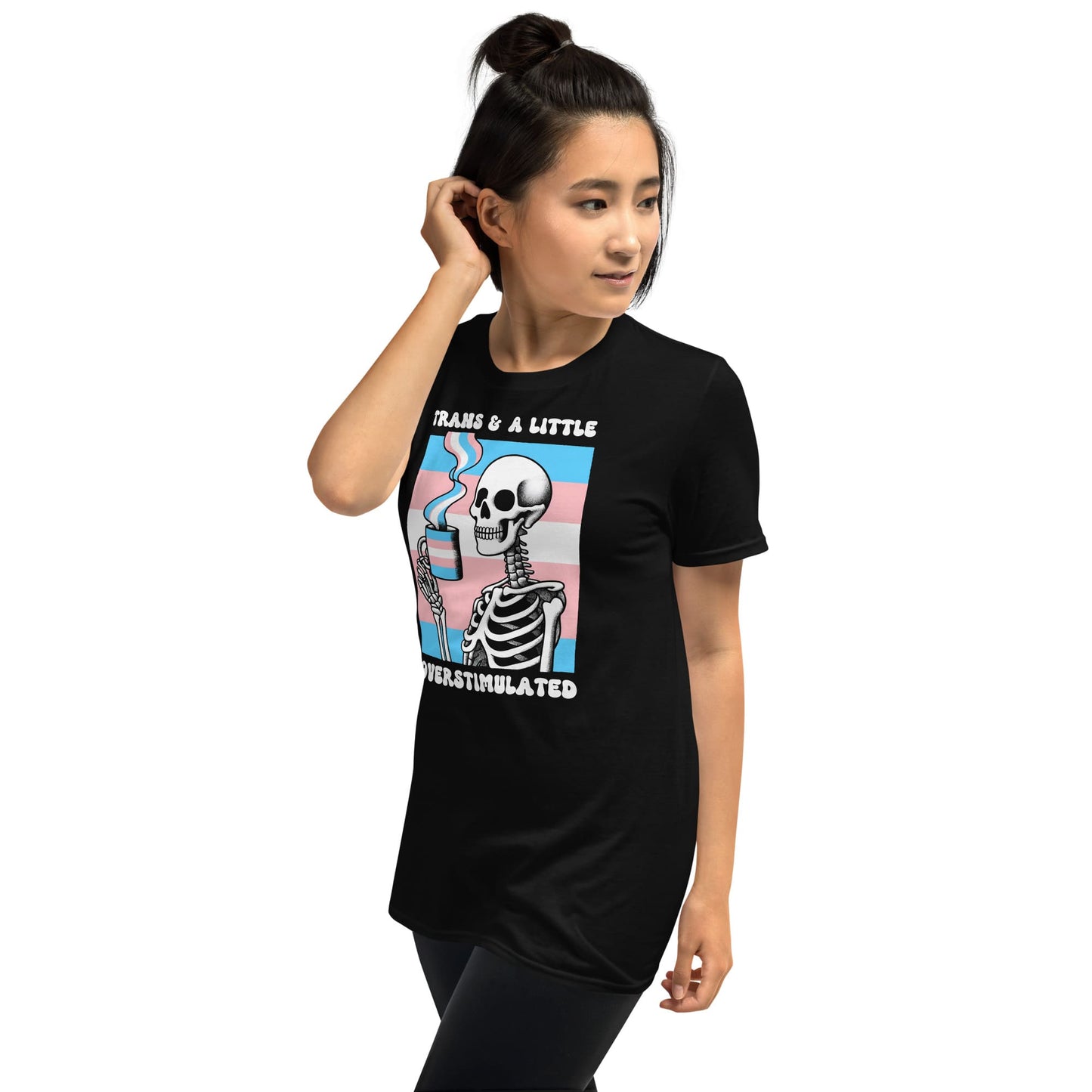 Person wearing a black t-shirt with a colorful graphic design featuring a skeleton and text: Transgender Anxiety Shirt, Overstimulated Tee, Mental Health T-Shirt, Trans Pride Skeleton Shirt, Sarcastic Neurospicy Gift For MTF Or FTM