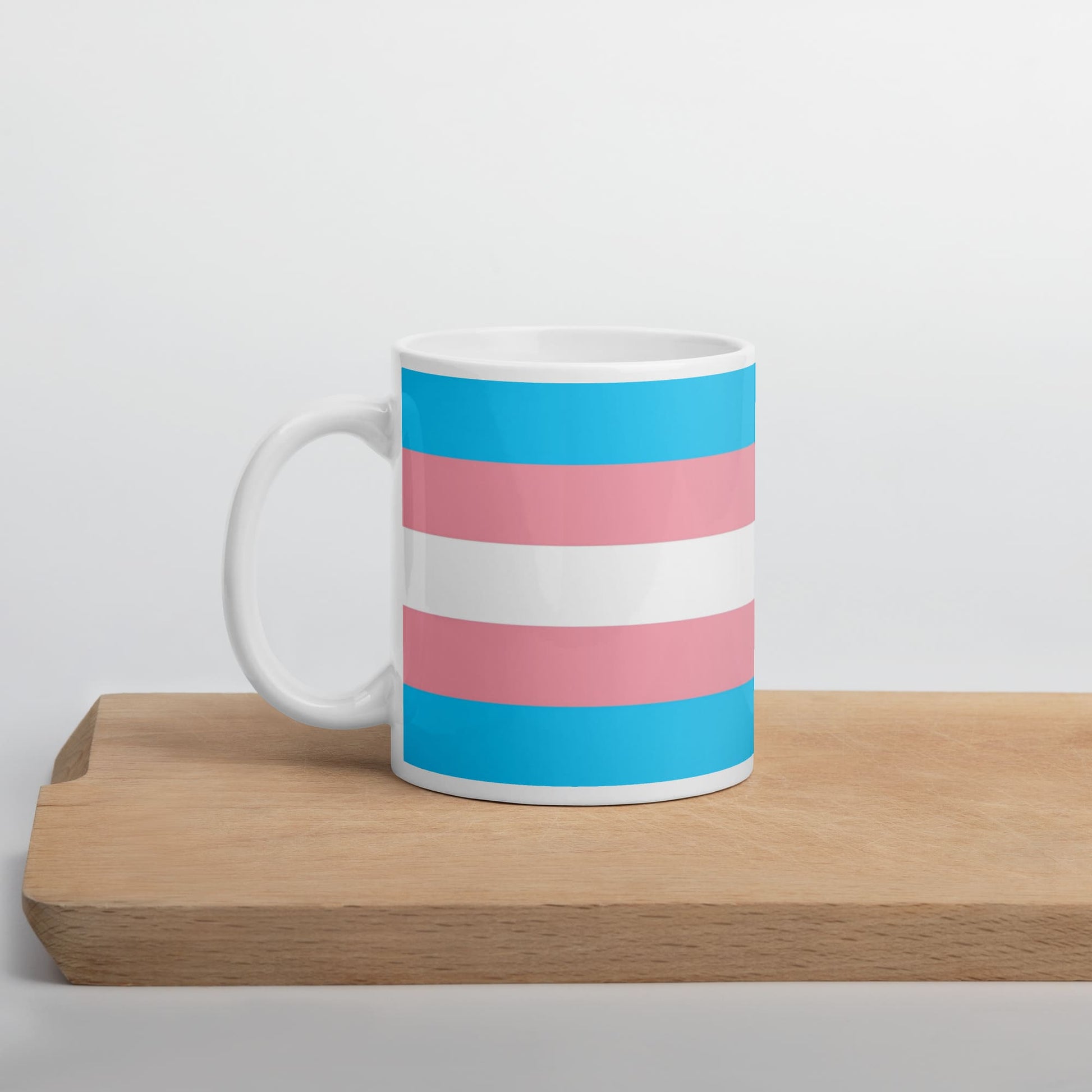 transgender coffee mug on table