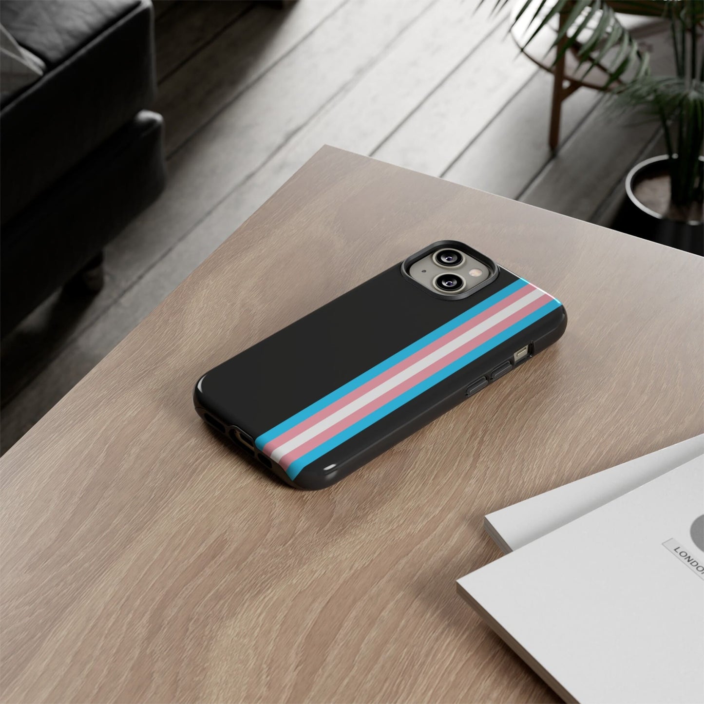transgender phone case, on table