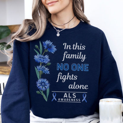 woman wearing navy ALS awareness sweatshirt