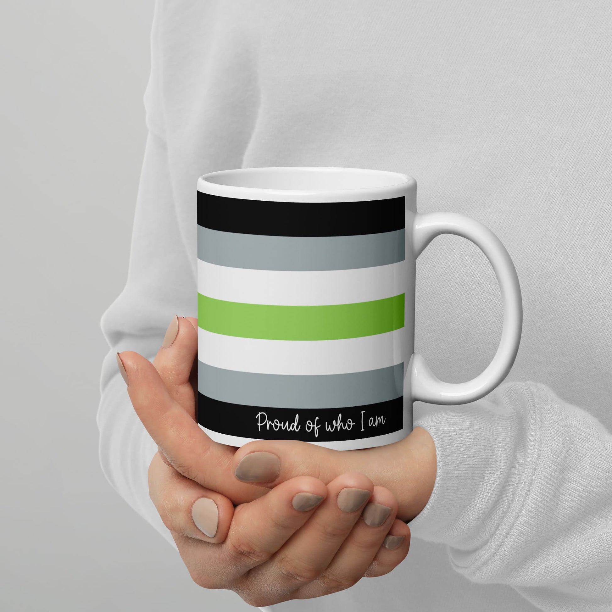 agender coffee mug on hands