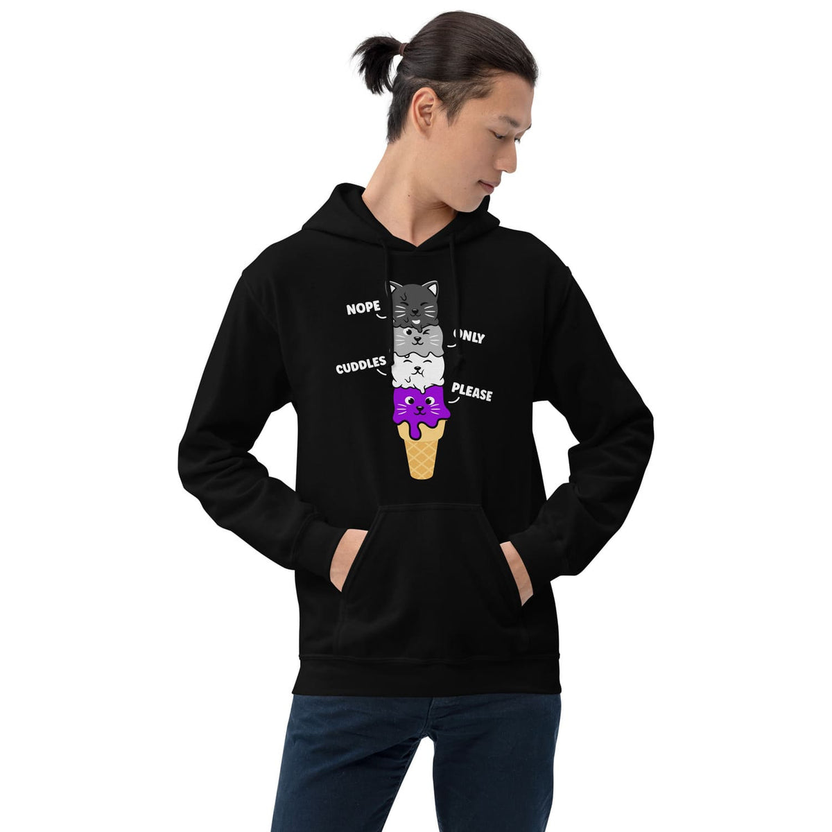 Person wearing a black kawaii asexual hoodie with a cat and ice cream design on a white background