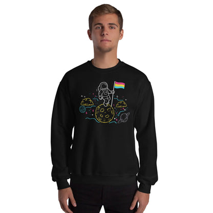Person wearing a black pansexual sweatshirt with an astronaut and pride flag design on a white background