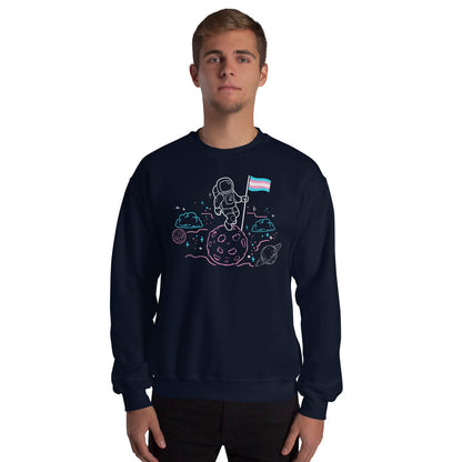 Person wearing a navy blue sweatshirt with an astronaut trans pride design on a white background