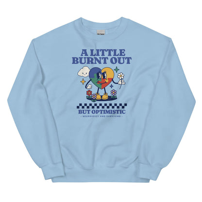 Light blue neurodivergent sweatshirt with colorful graphic and text on a white background