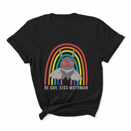 Black t-shirt with a graphic of Mothman and a rainbow, text 'Be Gay, Kiss Mothman' on a white background: LGBTQ Mothman Comfort Colors Shirt, Be Gay Kiss Mothman Tee, Queer Cryptid T-Shirt, LGBT Cryptidcore Gift, Rainbow Cryptozoology Merch