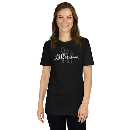 Woman wearing a black ENM polyamory t-shirt with 'Little spoon' design on a white background