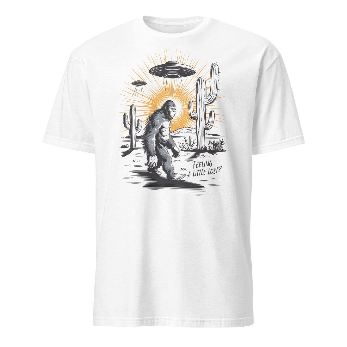 White t-shirt with a graphic of a Sasquatch, UFO, and cactus on a white background