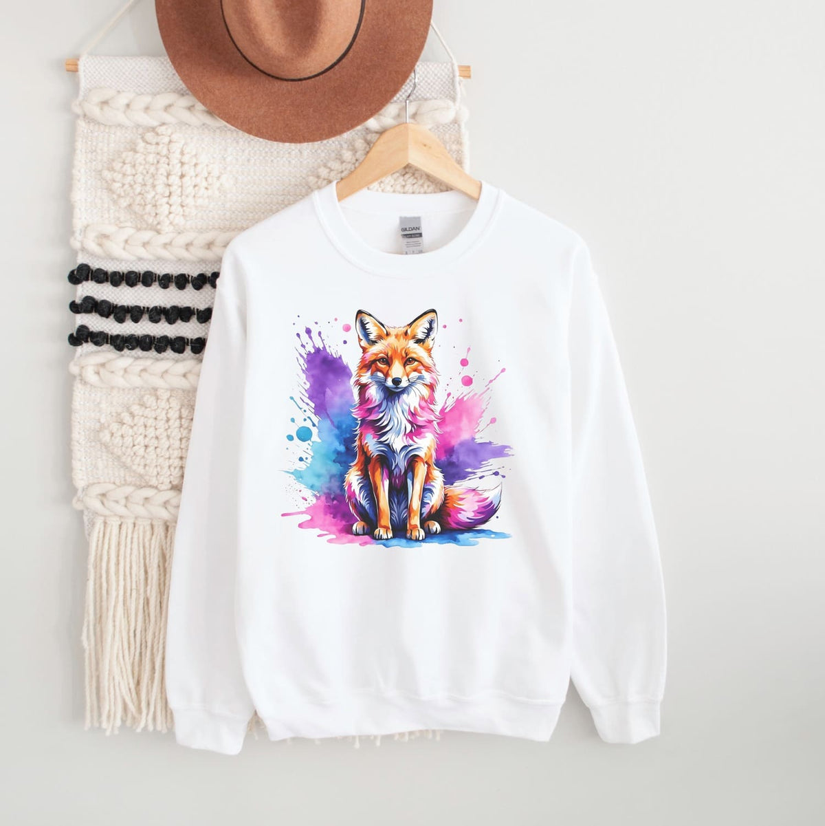 bisexual sweatshirt with bi pride fox hanging