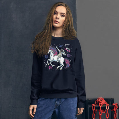 Woman wearing a bisexual sweatshirt with a unicorn and space-themed design against a dark background.