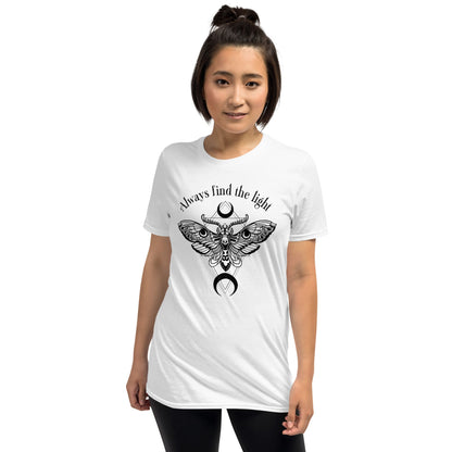 Woman wearing a white inspirational t-shirt with a black butterfly design and text on a white background