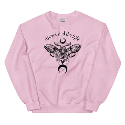 Pink inspirational sweatshirt with black moth design and 'Always find the light' text on a white background