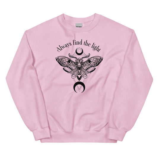Pink inspirational sweatshirt with black moth design and 'Always find the light' text on a white background
