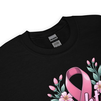 Black sweatshirt with pink breast cancer awareness ribbon and floral design on a white background