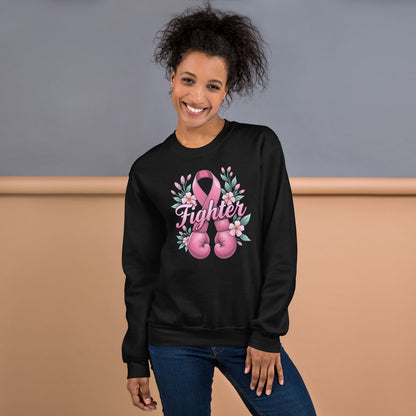 Woman wearing a black sweatshirt with a pink ribbon design and 'Fighter' text against a neutral background