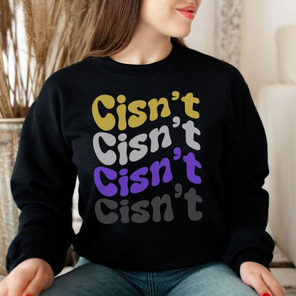 enby Person wearing a black nonbinary sweatshirt with 'Cisn't' text in different colors.