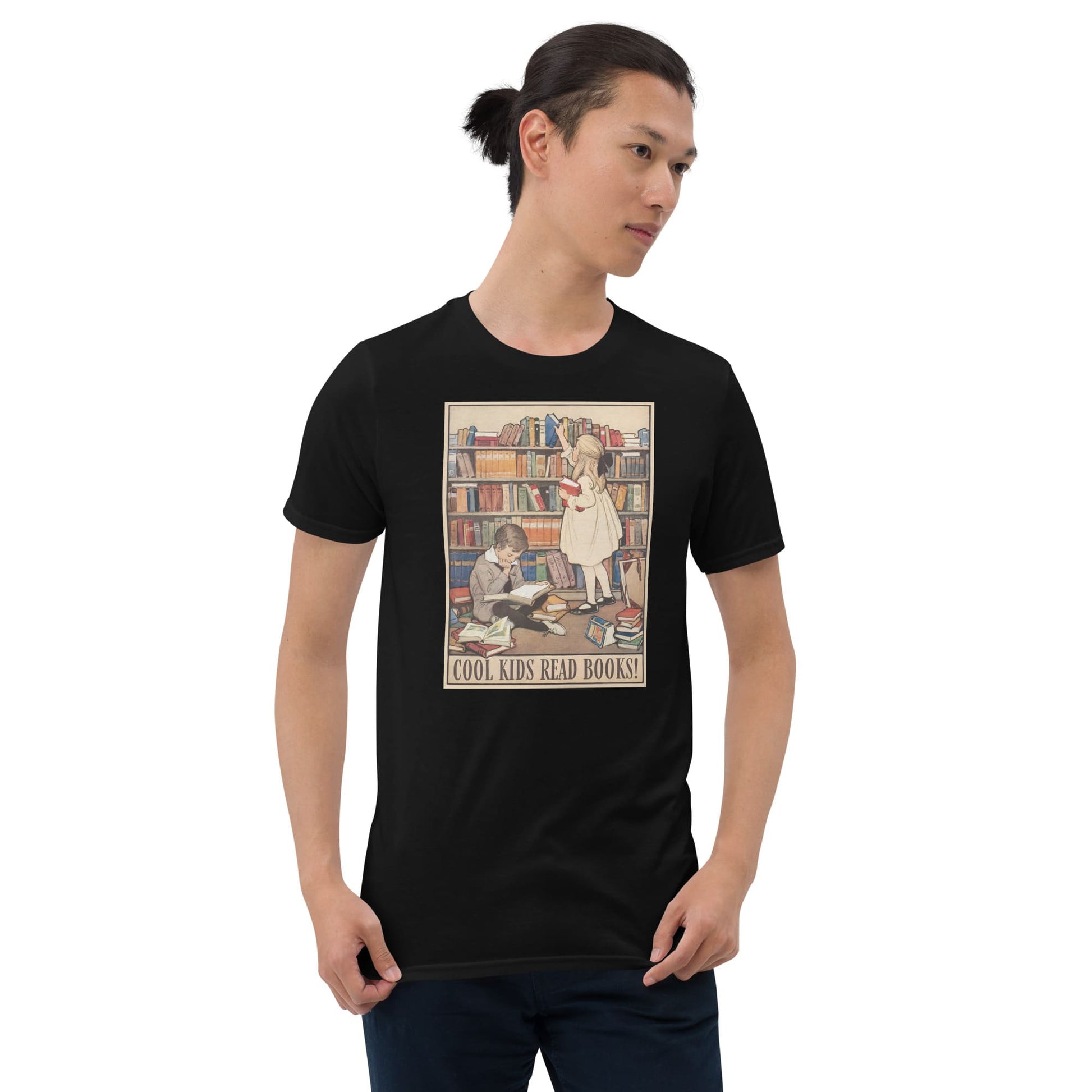 Person wearing a black t-shirt with a graphic design of children reading books.
