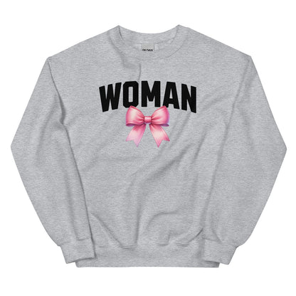 Gray mtf transgender sweatshirt with 'WOMAN' and a pink bow graphic on a white background