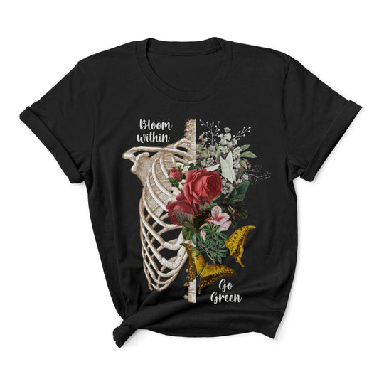 Black t-shirt with floral and skeleton design on a white background