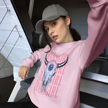 mtf trans Person wearing a pink transgender sweatshirt with a graphic design and text, sitting on a bench.