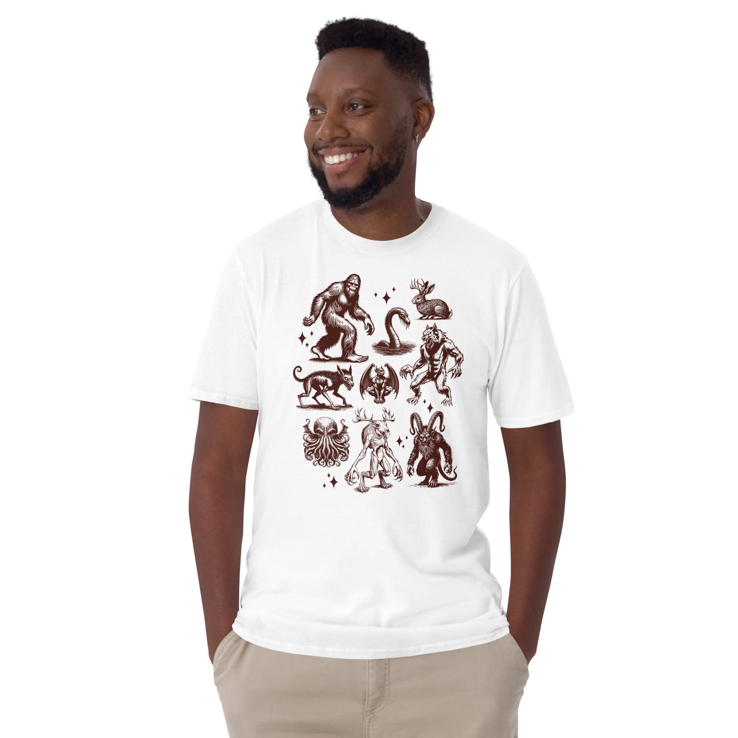 Man wearing a white t-shirt with brown graphic designs on a white background