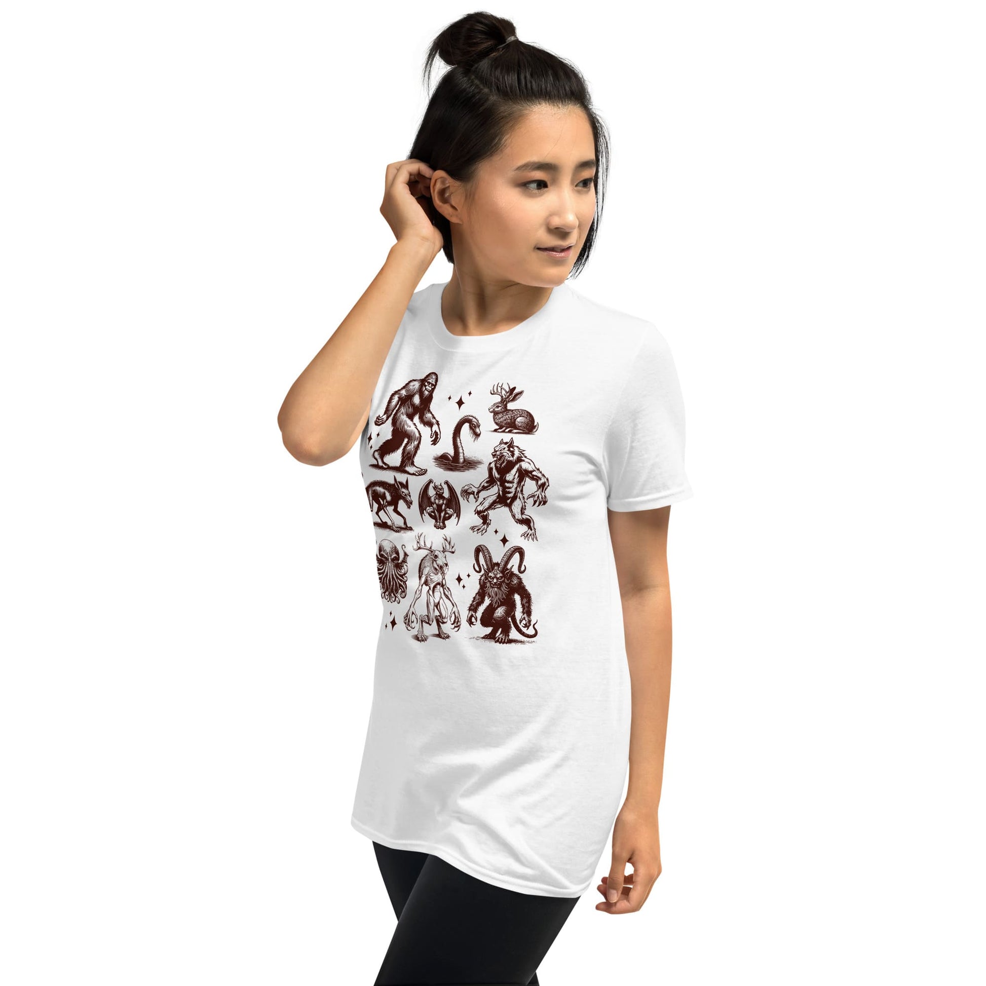 Person wearing a white t-shirt with brown graphic designs on a white background