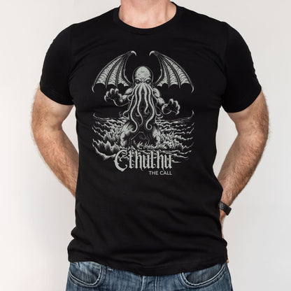 Black t-shirt with a graphic design of cthulhu, worn by a person.