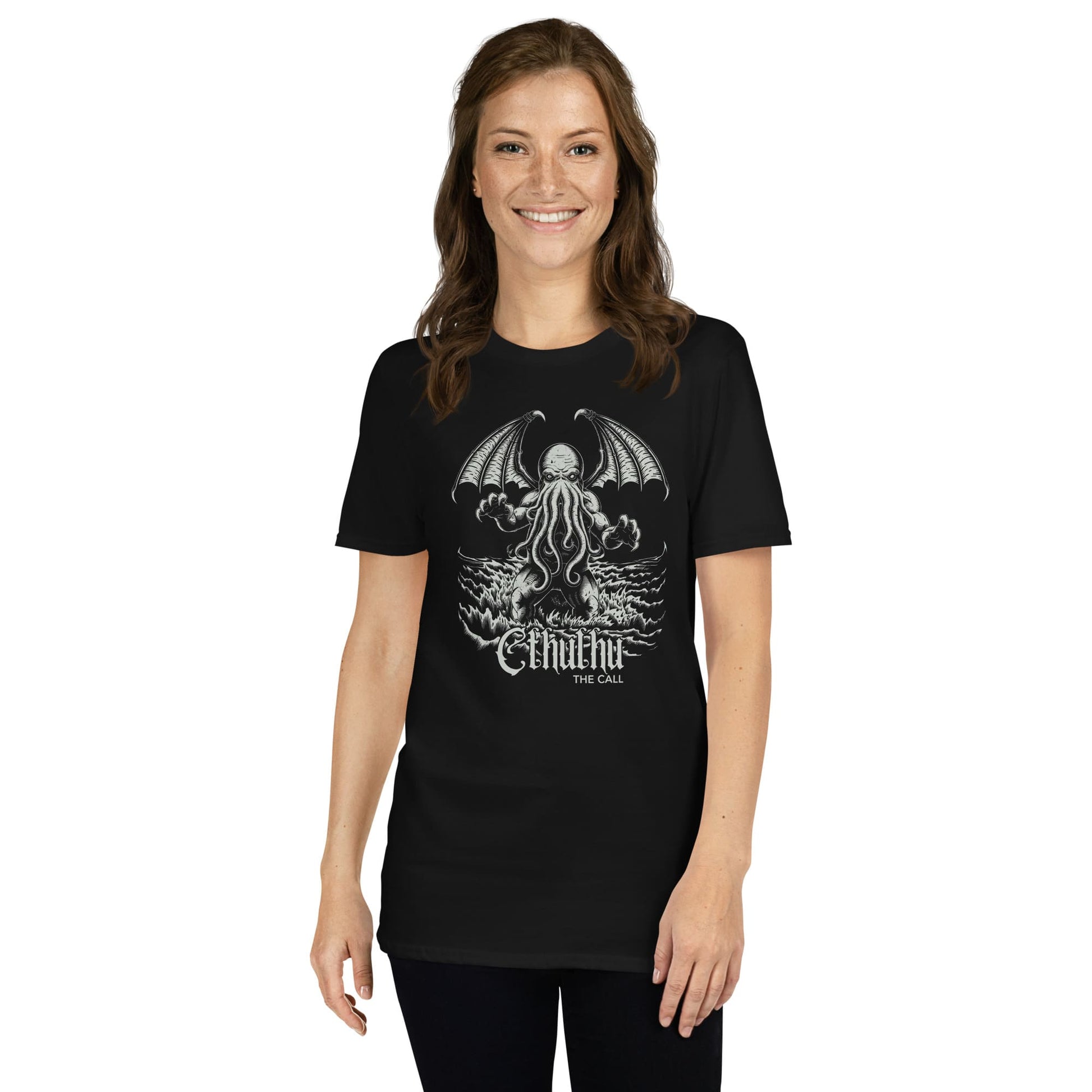 Person wearing a black t-shirt with cthulhu on a white background
