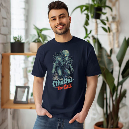 Man wearing a navy blue t-shirt with a graphic design of cthulhu
