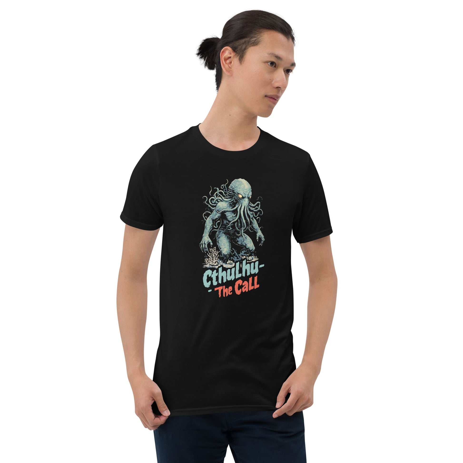 Person wearing a black t-shirt with 'Cthulhu: The Call' graphic design on a white background