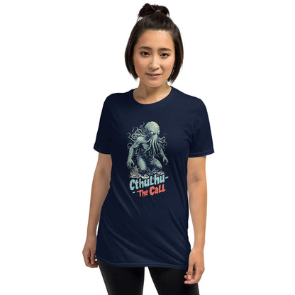 Person wearing a navy blue t-shirt with cthulhu on a white background