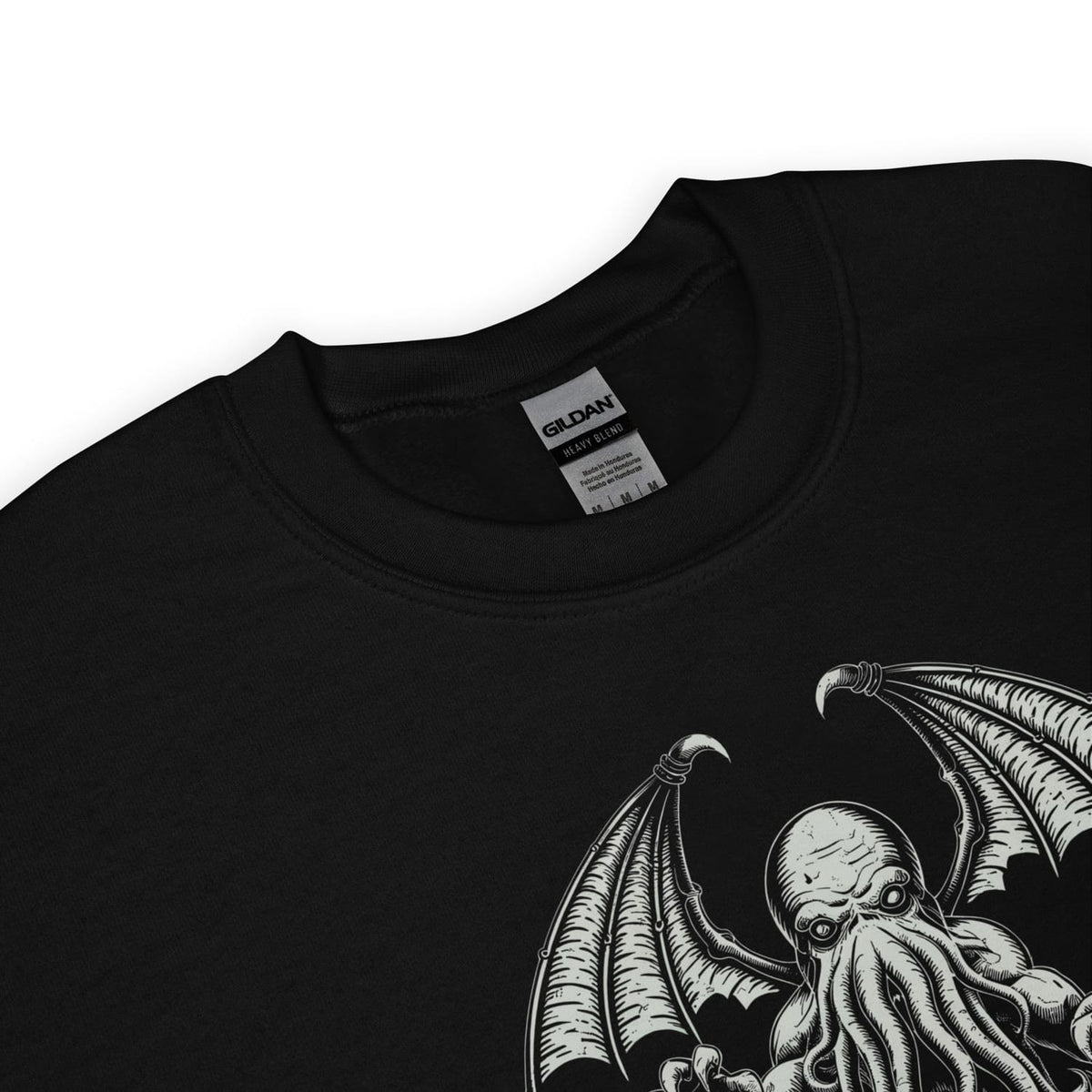 Black t-shirt with a detailed illustration of cthulhu on a white background