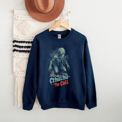 Navy blue sweatshirt with Cthulhu graphic and 'The Call' text on a white background