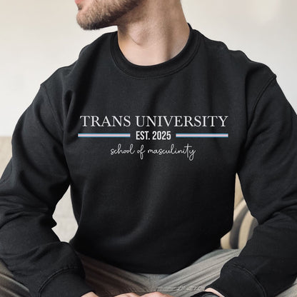 Person wearing a transgender ftm black sweatshirt with 'Trans University Est. 2025 School of Masculinity' text.