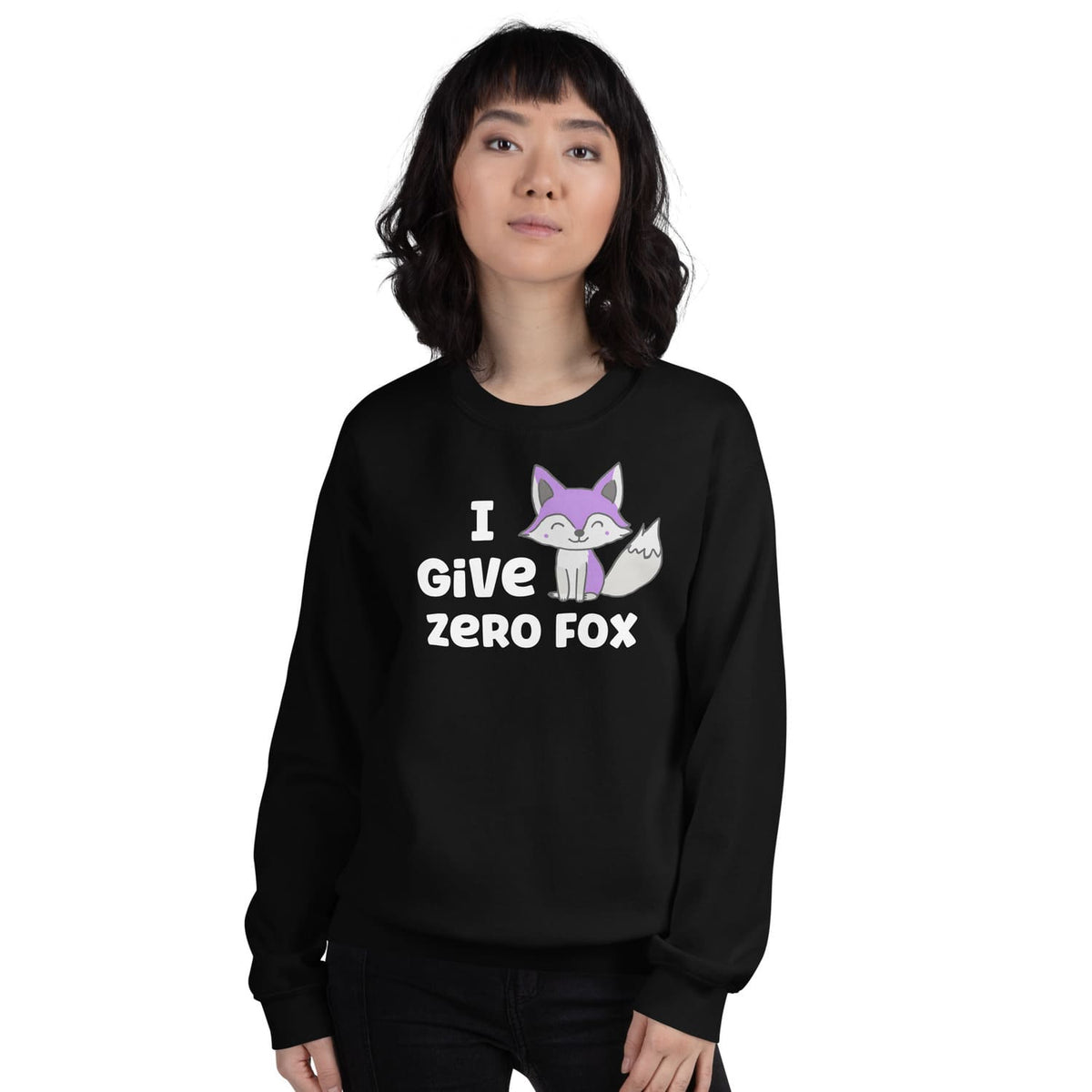 Person wearing a black asexual sweatshirt with a fox graphic and text on a white background