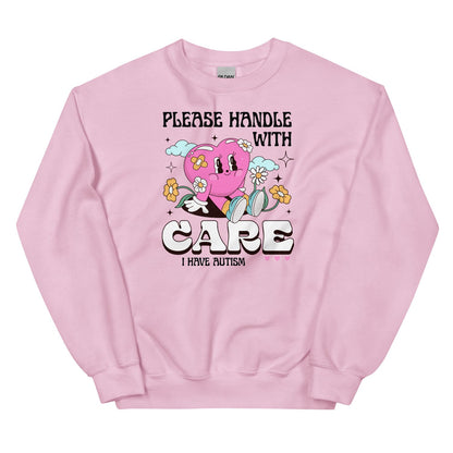 Pink autism sweatshirt with a heart design and text on a white background