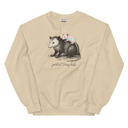 Beige sweatshirt with an illustration of an opossum and baby opossum, and text 'protect trans kids' on a white background.