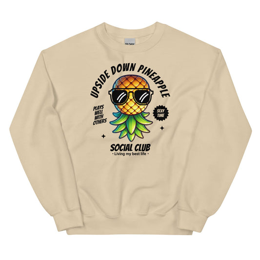 Beige swingers sweatshirt with an upside down pineapple graphic and text on a white background