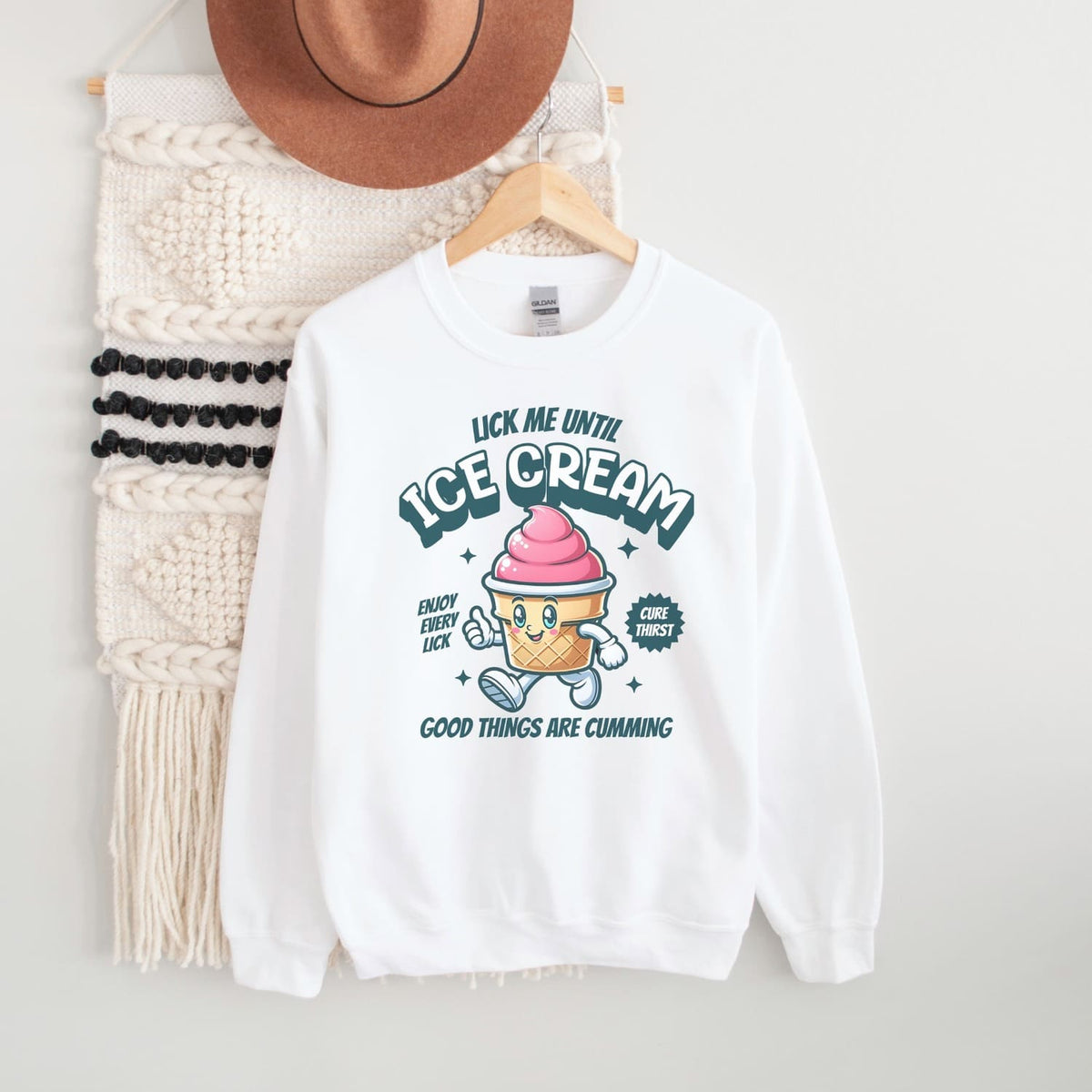 White adult humor sweatshirt with ice cream graphic and text on a white background