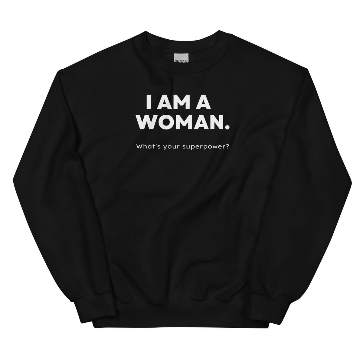 Black feminist sweatshirt with white text 'I AM A WOMAN. What's your superpower?' on a white background