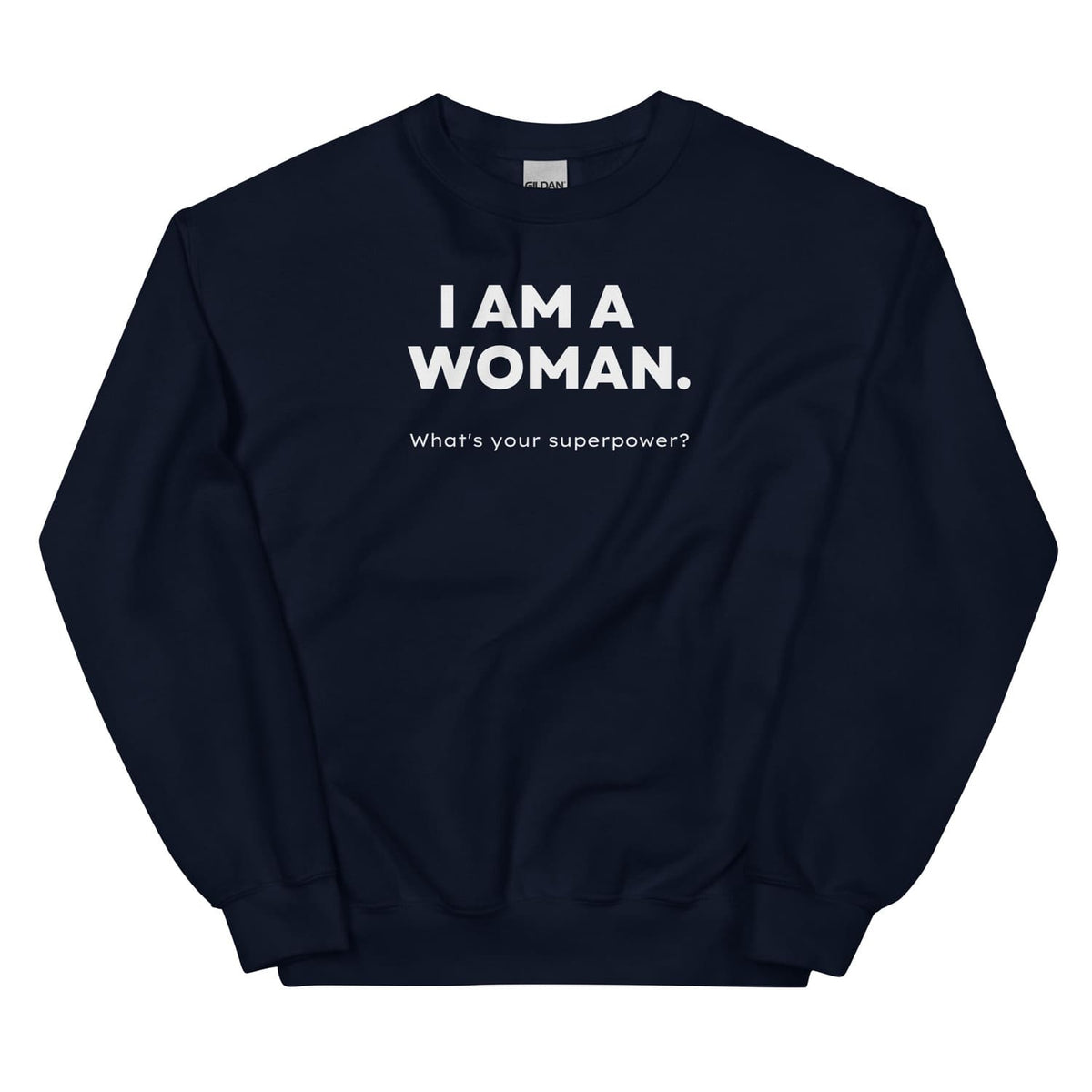 Navy feminist sweatshirt with white text 'I AM A WOMAN. What's your superpower?' on a white background