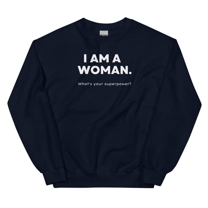 Navy feminist sweatshirt with white text 'I AM A WOMAN. What's your superpower?' on a white background