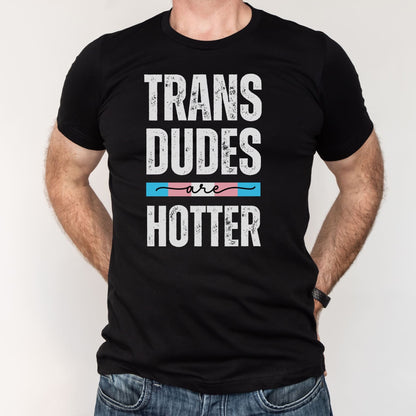Black transgender ftm t-shirt with 'TRANS DUDES ARE HOTTER' text and Trans flag design on a white background