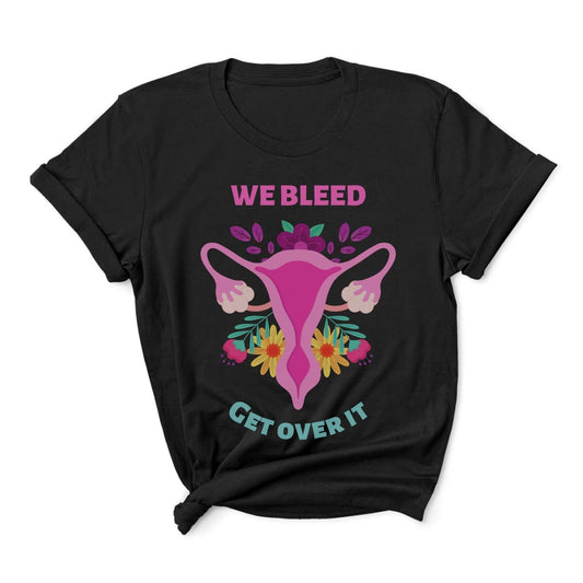 Black feminist  t-shirt with a graphic of a uterine cervix and flowers, accompanied by the text 'WE BLEED GET OVER IT'.