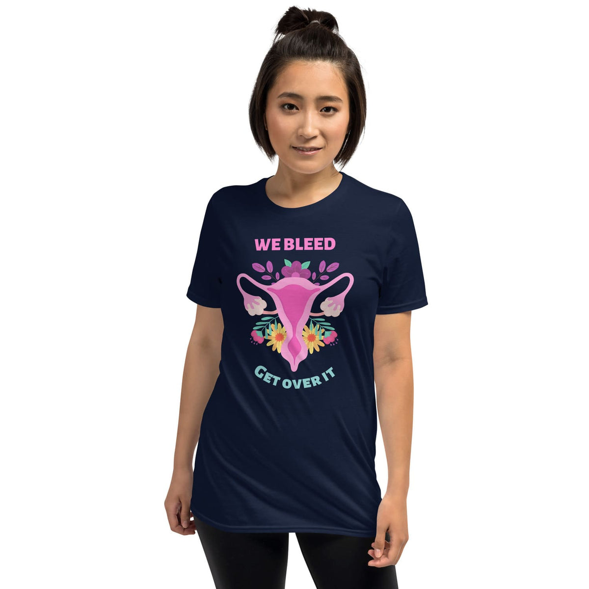 Person wearing a navy feminist t-shirt with an American flag design and text on a white background