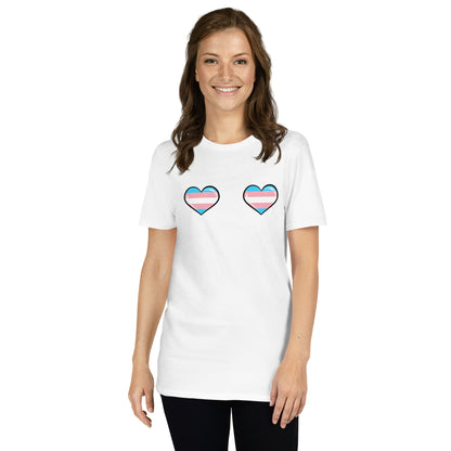 mtf trans woman wearing a white t-shirt with two heart symbols featuring the transgender flag design on a white background