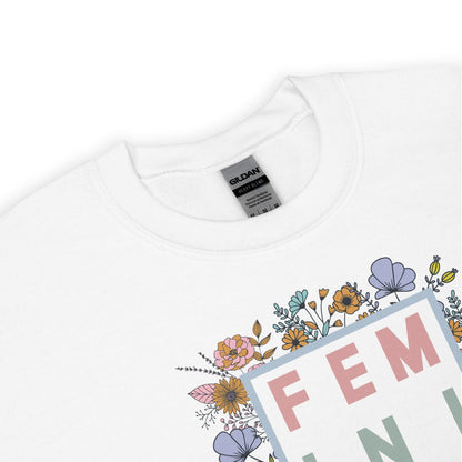 White sweatshirt with floral design and 'FEMINIST' text on a white background